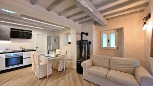 Kuchyň nebo kuchyňský kout v ubytování Mulino La Pietra + 19 fotografií