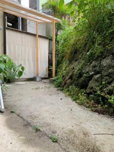 Κήπος έξω από το GUESTHOUSE UJIRIVER Kyoto