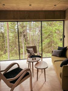 Posezení v ubytování Trakt Forest Hotel Skogssviter