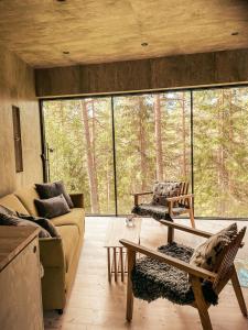 Posezení v ubytování Trakt Forest Hotel Skogssviter