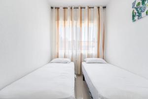 A bed or beds in a room at Casa Las Calas