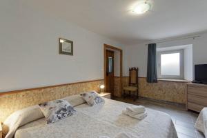 Postel nebo postele na pokoji v ubytování Apartments Smile by Rent Istria