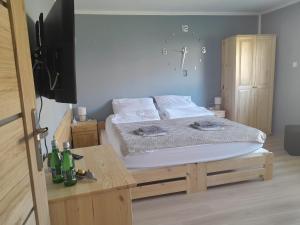 Pokoje Bory Tucholskie客房内的一张或多张床位