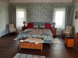 Postel nebo postele na pokoji v ubytování B&B Romantico Palazzo dei Ulivi