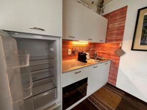 Kuchyň nebo kuchyňský kout v ubytování B&B Romantico Palazzo dei Ulivi