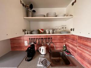 Kuchyň nebo kuchyňský kout v ubytování B&B Romantico Palazzo dei Ulivi