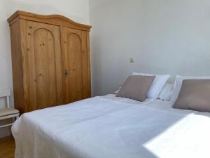 Posteľ alebo postele v izbe v ubytovaní Weinlandhaus