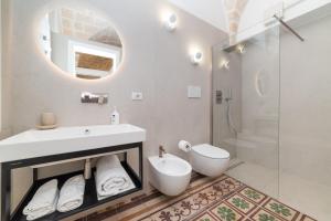 Ванная комната в Elegance Staffa Rooms 200 metri dal centro storico