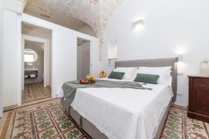 Кровать или кровати в номере Elegance Staffa Rooms 200 metri dal centro storico