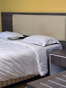 Ένα ή περισσότερα κρεβάτια σε δωμάτιο στο A307 Entire Studio in Ayer Keroh