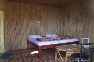 מיטה או מיטות בחדר ב-Basera Home stay