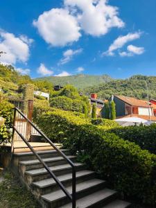 a set of stairs leading up to a house at VILLA MONTESOLE in Lecco