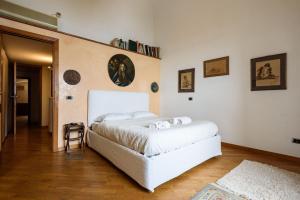 Postel nebo postele na pokoji v ubytování Via Posillipo 335