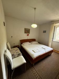 Ein Bett oder Betten in einem Zimmer der Unterkunft Accommodation Old Town Vitaic