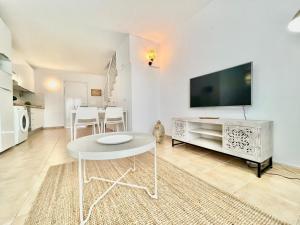 Telewizja i/lub zestaw kina domowego w obiekcie La Casa de las Flores