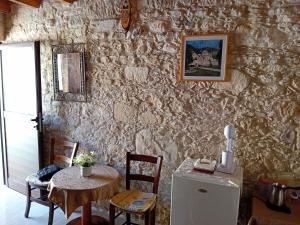 Fotografie z fotogalerie ubytování TRADITIONAL HOUSE ARSOS v destinaci Arsos