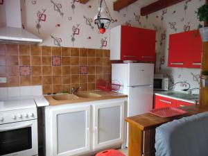 Køkken eller tekøkken på Le Pinot - Gîte - Lot - Vallée de la Dordogne