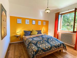 Postel nebo postele na pokoji v ubytování Villa Rosa Friuli