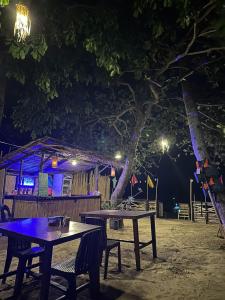 Restaurace v ubytování Seaside Cabin Bucana