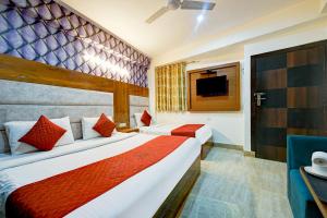 מיטה או מיטות בחדר ב-Airport Hotel Ark View
