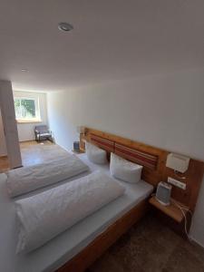Postel nebo postele na pokoji v ubytování Hotel Großbach