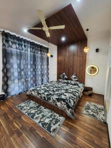 Letto o letti in una camera di Serenity Inn home stay