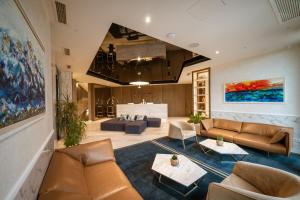 a large living room with couches and tables at Hotel Imperial Conference & Spa in Budva