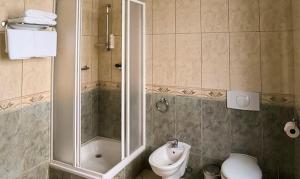 Koupelna v ubytování Residence Romanza + 37 fotografií