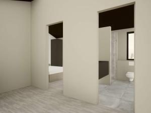 baño con paredes blancas y aseo en 5 star holiday home in R m, en Lakolk
