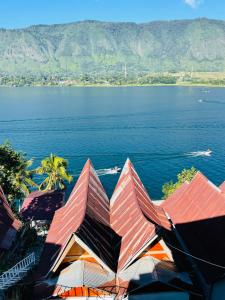 a view of a large body of water at Elsina guest house in Tuk Tuk