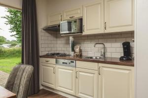 Gallery image of Groepsaccommodatie [2x Reggehooiberg 5p met grote achtertuin] in Zuna