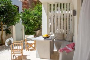 Posezení v ubytování Kynthia Suite - Escape to Seaside Makry Gialos
