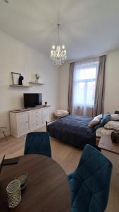Posteľ alebo postele v izbe v ubytovaní Deco Studio City Residence