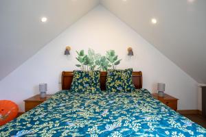 Ліжко або ліжка в номері Oasis tropicale a Cleguerec