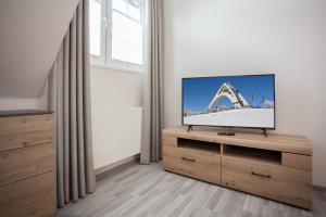TV tai viihdekeskus majoituspaikassa Apartment - Am Südhang 11 Winterberg