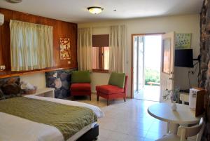 Postel nebo postele na pokoji v ubytování Vered Hagalil Holiday Village Hotel + 37 fotografií