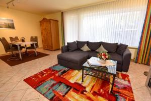 Posezení v ubytování Haus "Luv und Lee" Appartement LUV32 + 10 fotografií