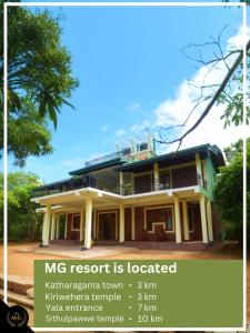 a house with a sign in front of it at MG Resort - Yala in Kataragama