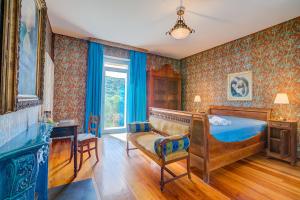 Postel nebo postele na pokoji v ubytování Villa Tagini 10 minutes from Stresa - Happy Rentals