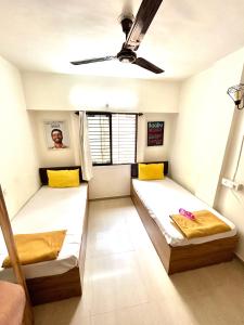 Ліжко або ліжка в номері Procida Hostel by Vibe Village