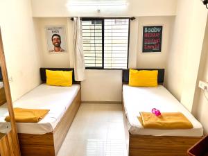 Ліжко або ліжка в номері Procida Hostel by Vibe Village