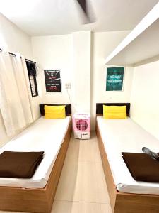 Ліжко або ліжка в номері Procida Hostel by Vibe Village