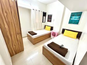 Ліжко або ліжка в номері Procida Hostel by Vibe Village