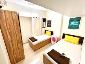 Ліжко або ліжка в номері Procida Hostel by Vibe Village