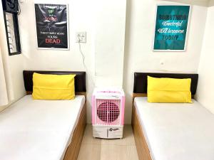 Ліжко або ліжка в номері Procida Hostel by Vibe Village