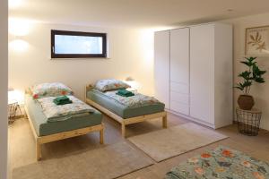 Кровать или кровати в номере Waldhaus