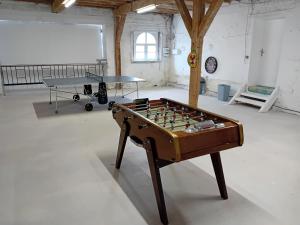 Žaidimų kambarys apgyvendinimo įstaigoje Le Domaine du Tronquoi.