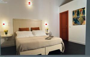 Postel nebo postele na pokoji v ubytování Boutique Hotel Molo S Lucia