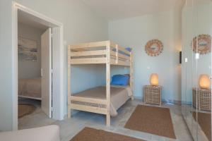 A bed or beds in a room at Nikos Studios