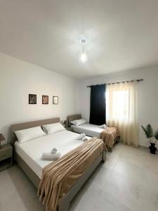 Js House Shkoder 3房間的床 +37 張相片